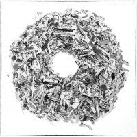 papeles recortados formando una figura toroidal